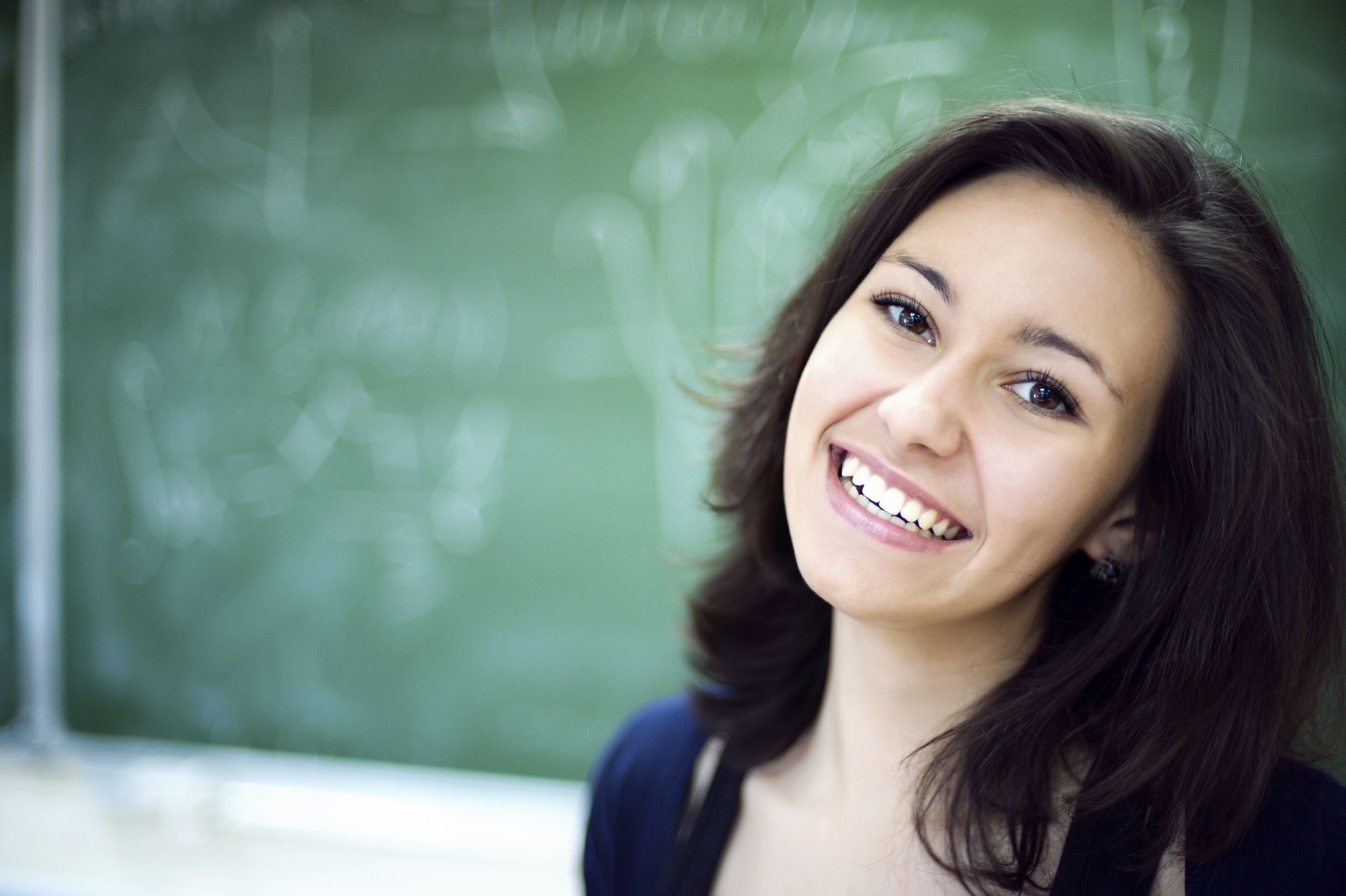 Smiling student who is happy with the advice she was given by student services.